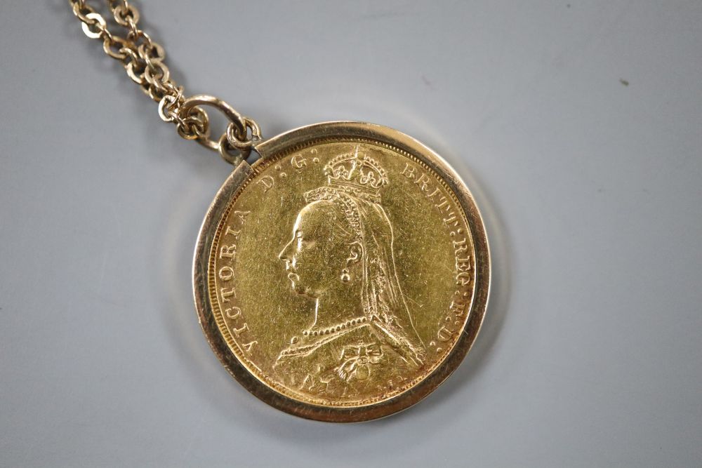 An 1888 gold full sovereign pendant in 9ct gold mount, with 9ct chain, gross 12.9 grams.